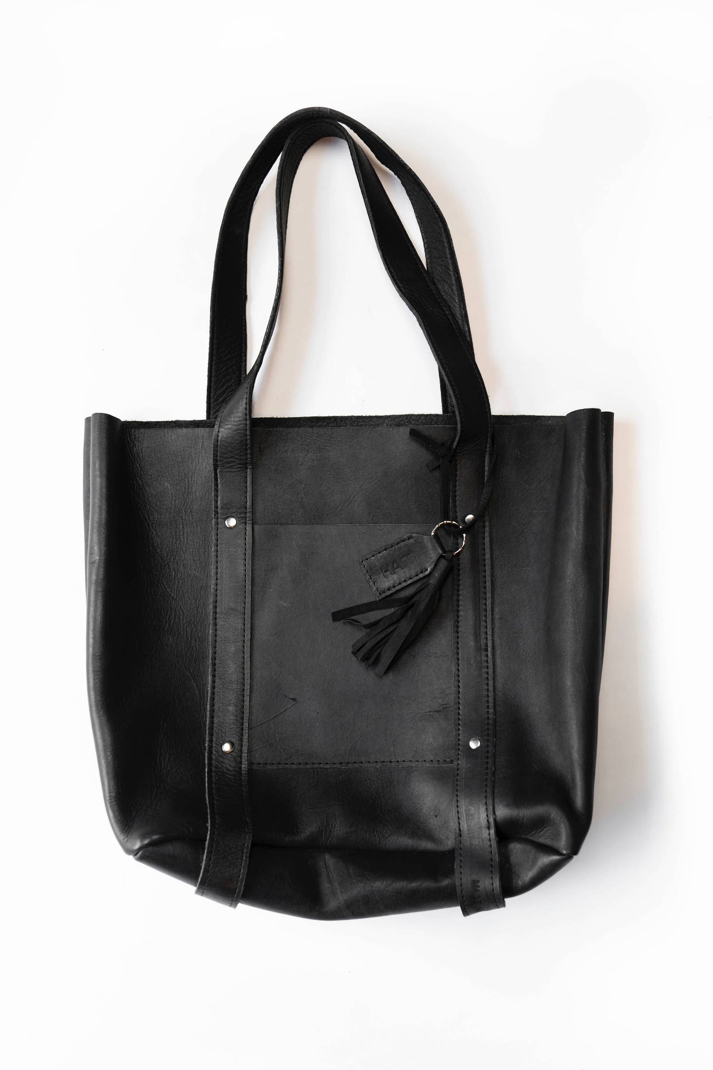 
                  
                    Large Raw Leather Tote by 2nd Story Goods
                  
                