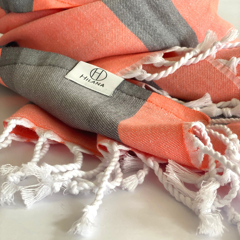 
                  
                    Samara Gray - Orange Turkish Towel by Hilana Upcycled Cotton
                  
                