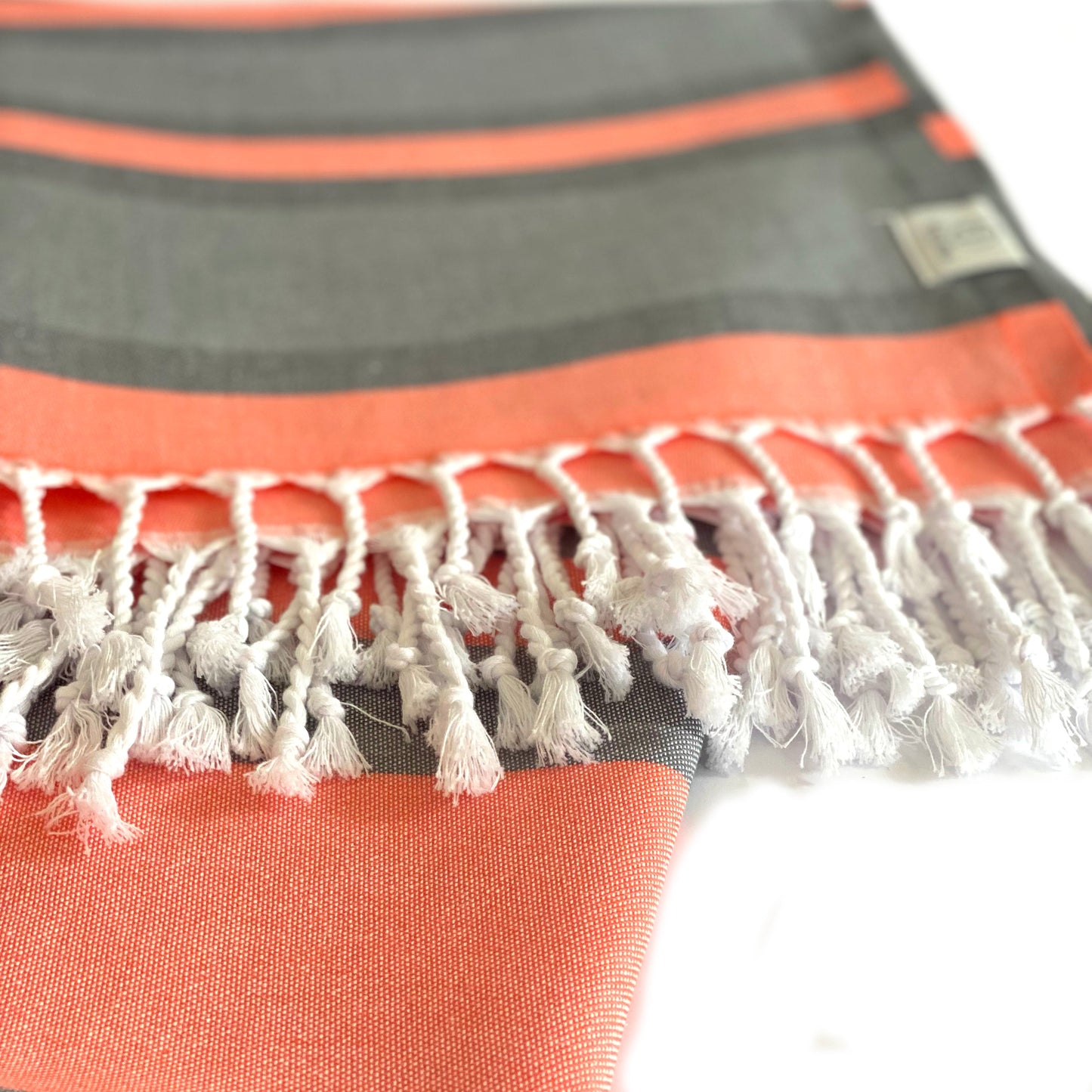 
                  
                    Samara Gray - Orange Turkish Towel by Hilana Upcycled Cotton
                  
                