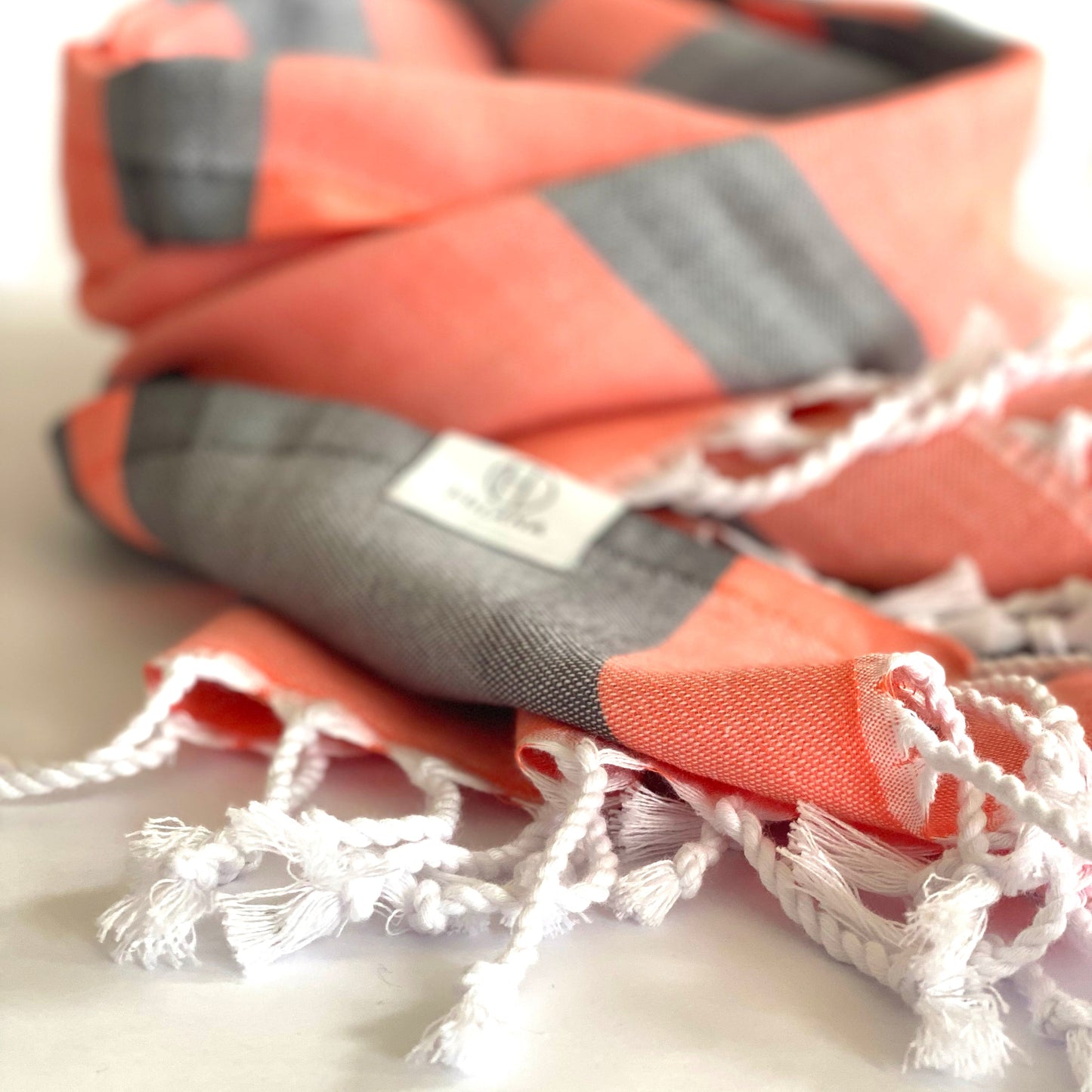 
                  
                    Samara Gray - Orange Turkish Towel by Hilana Upcycled Cotton
                  
                