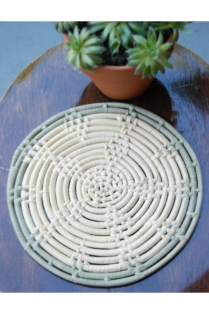 
                  
                    Round 8 inch Trivet with Sage Trim by 2nd Story Goods
                  
                