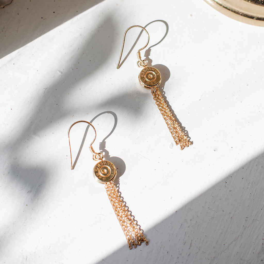 
                  
                    Bullet Tassel Earrings by SLATE + SALT
                  
                