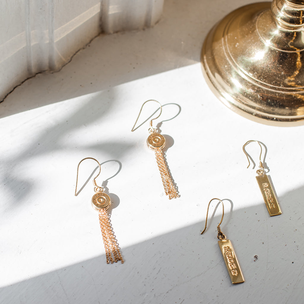 
                  
                    Bullet Tassel Earrings by SLATE + SALT
                  
                