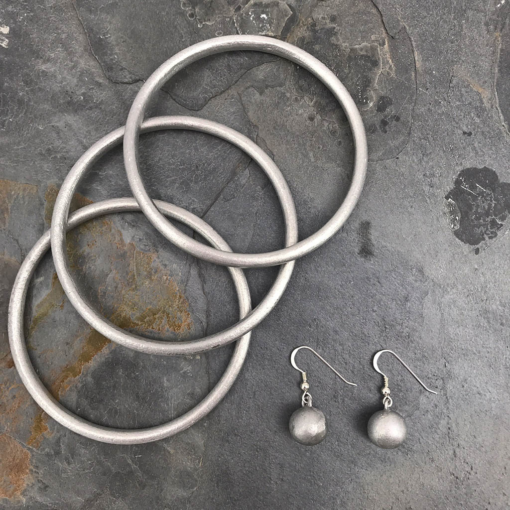 
                  
                    Recycled Bomb Ball Earrings by SLATE + SALT
                  
                