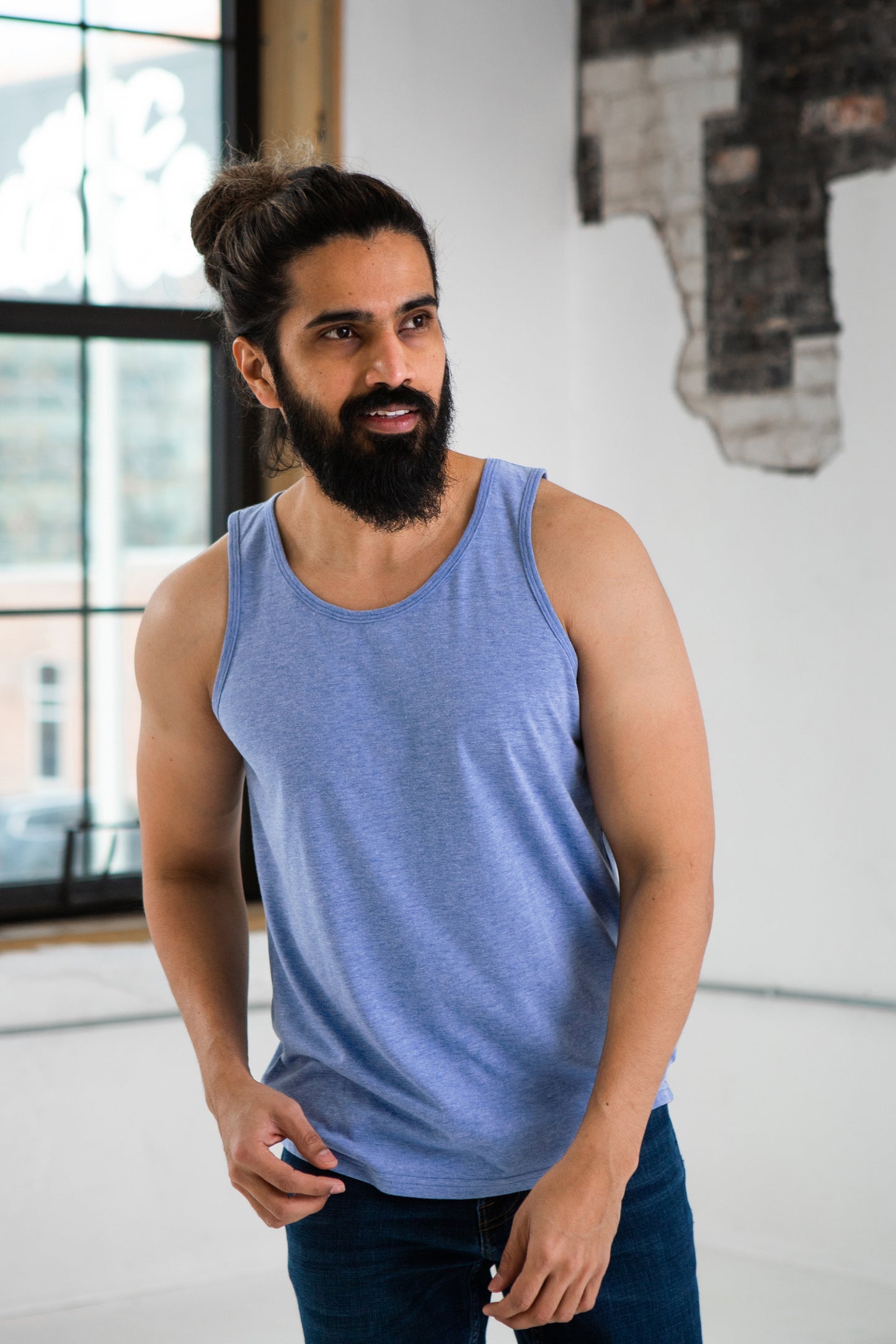 
                  
                    Unisex Eco-Triblend Tank
                  
                
