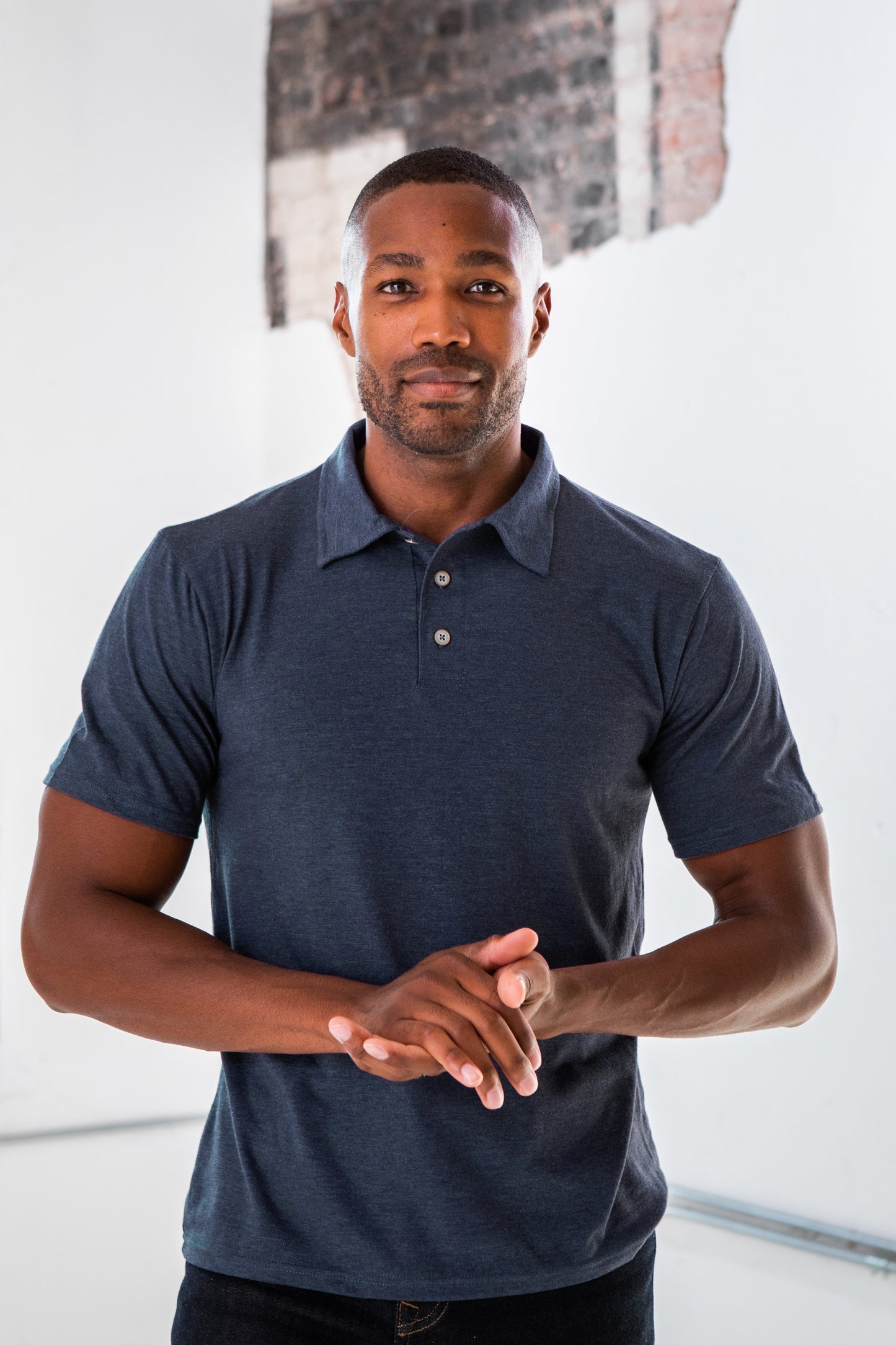 
                  
                    Unisex Eco-Triblend Polo
                  
                