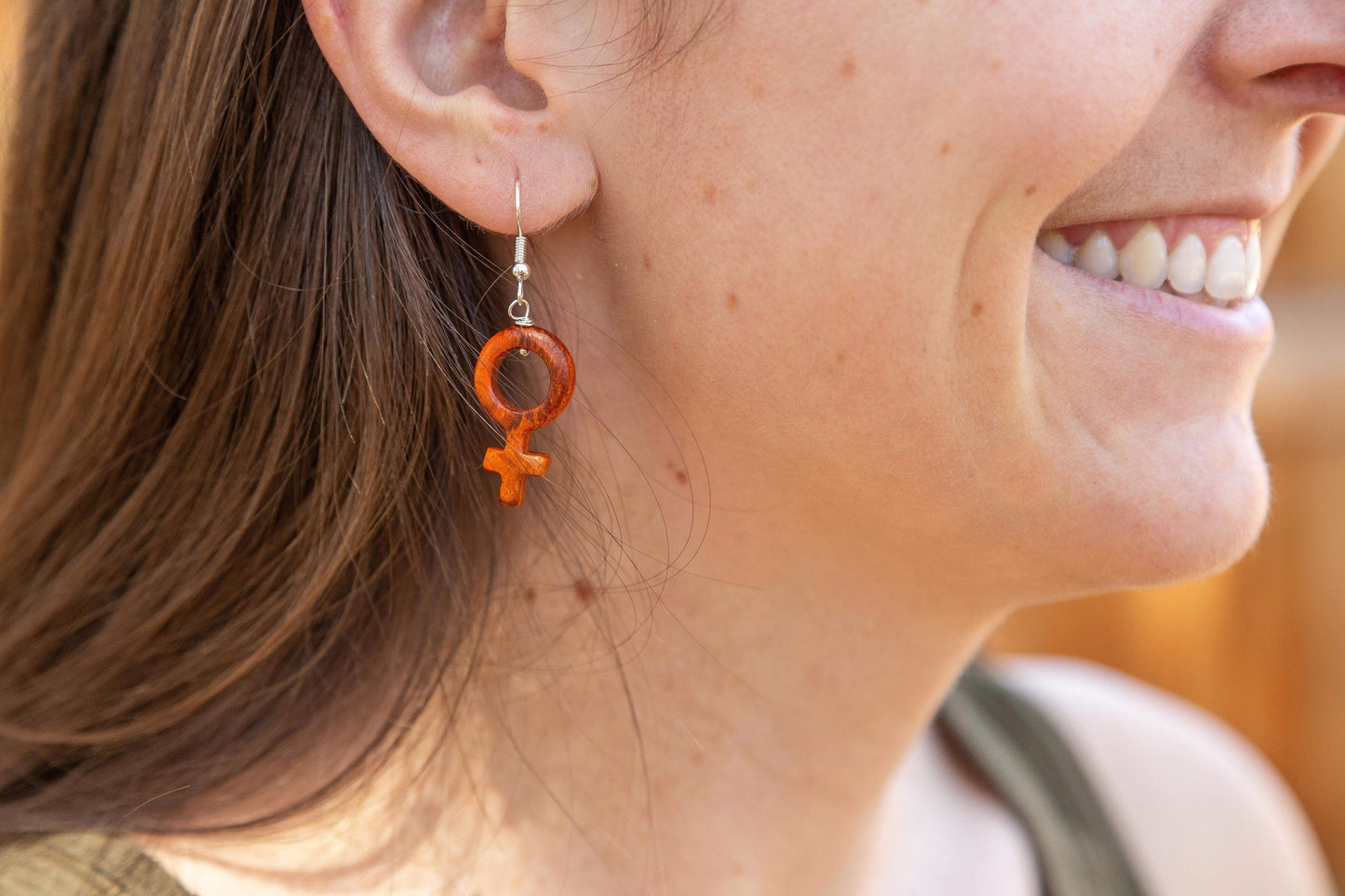 
                  
                    Wood Female Symbol Earrings
                  
                