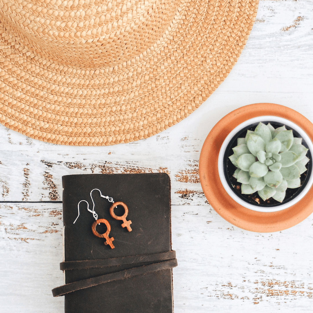 
                  
                    Wood Female Symbol Earrings
                  
                