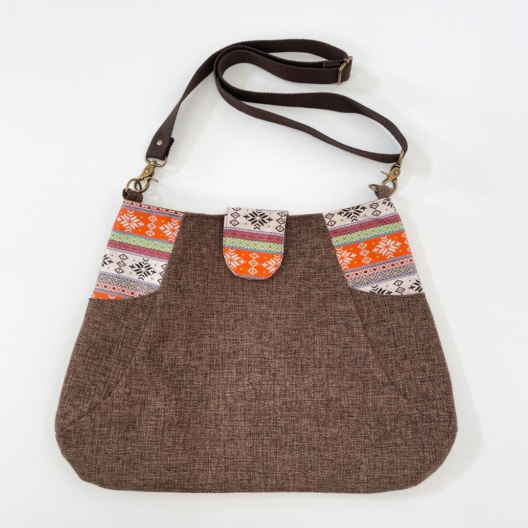 
                  
                    NORBOO | DECHEN cross body bag by Carry Courage
                  
                