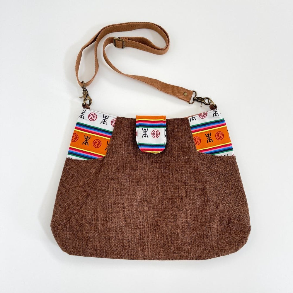 
                  
                    NORBOO | DECHEN cross body bag by Carry Courage
                  
                