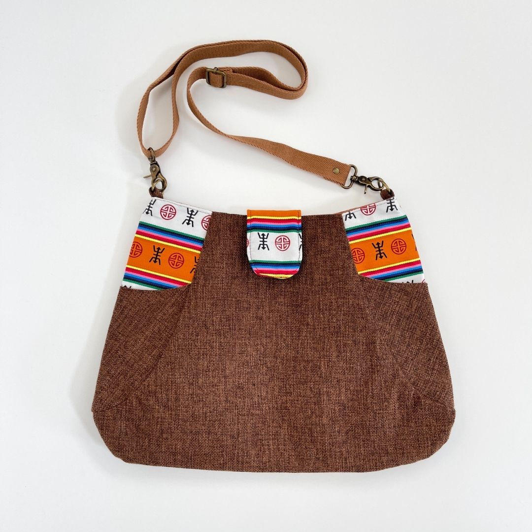 
                  
                    NORBOO | DECHEN cross body bag by Carry Courage
                  
                