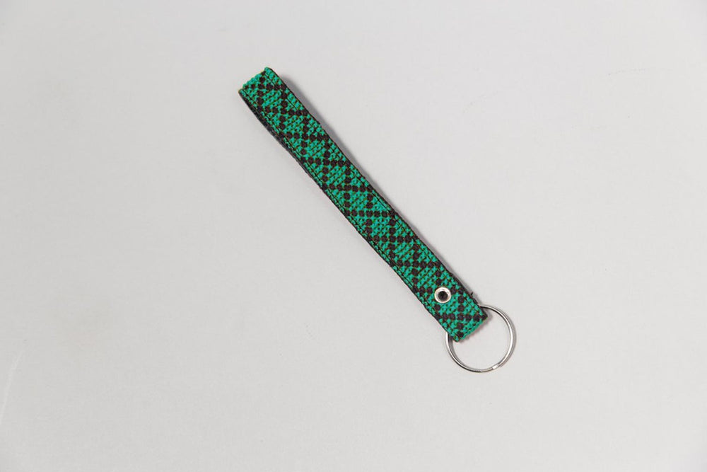 
                  
                    The Teal Leather Key Fob
                  
                