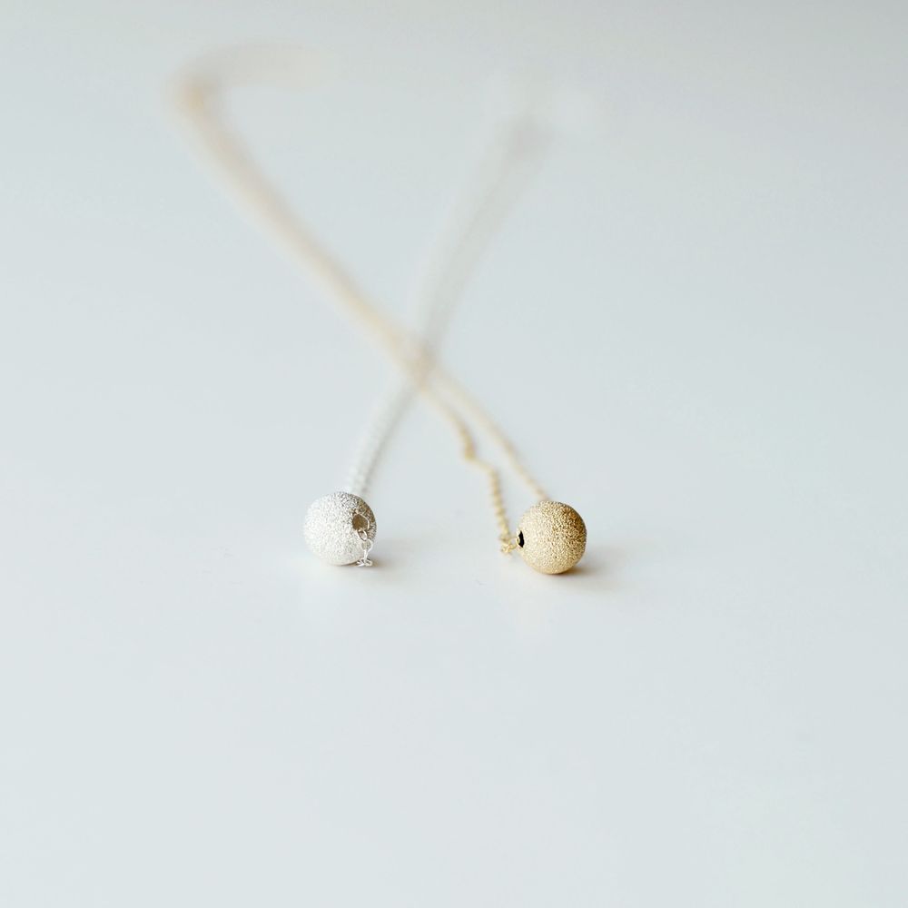 
                  
                    Tala Necklace
                  
                