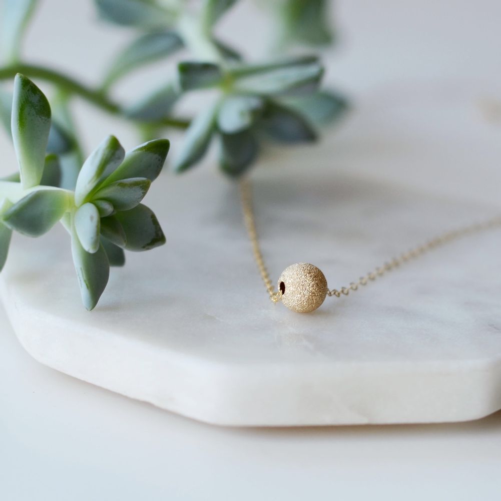 
                  
                    Tala Necklace
                  
                