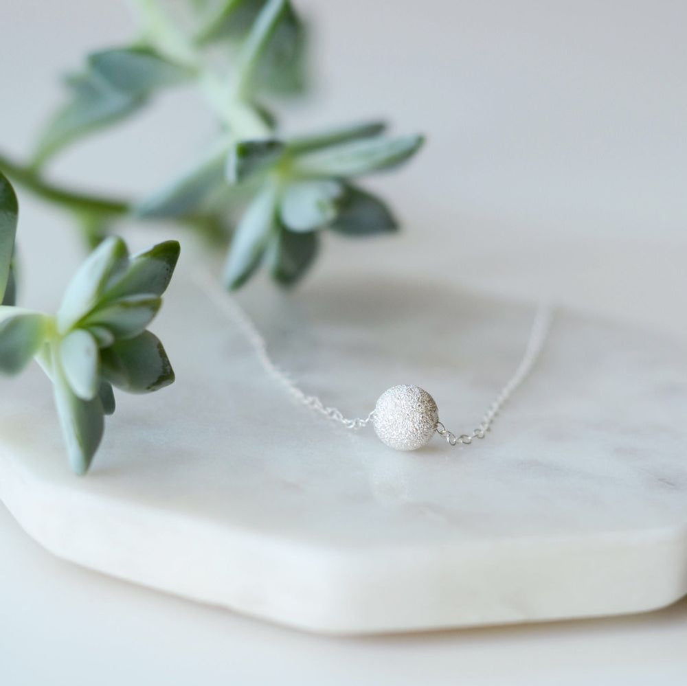 
                  
                    Tala Necklace
                  
                