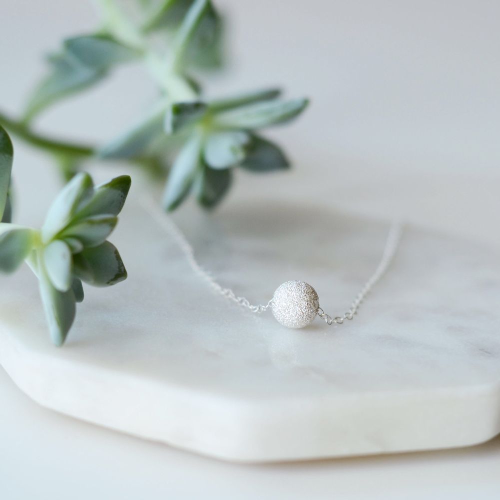 
                  
                    Tala Necklace
                  
                